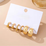 MIXED TEXTURE GOLD CRESCENT HOOP TRIO
EARRING SET