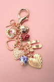 PORCELAIN BOWS HEARTS PEARL STRAWBERRY BAG CHARM