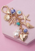 PORCELAIN SEA LIFE PEARL HEART TURQ BEAD BAG CHARM