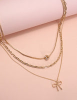 Multi-Layer Pearl Bow Charm Necklace